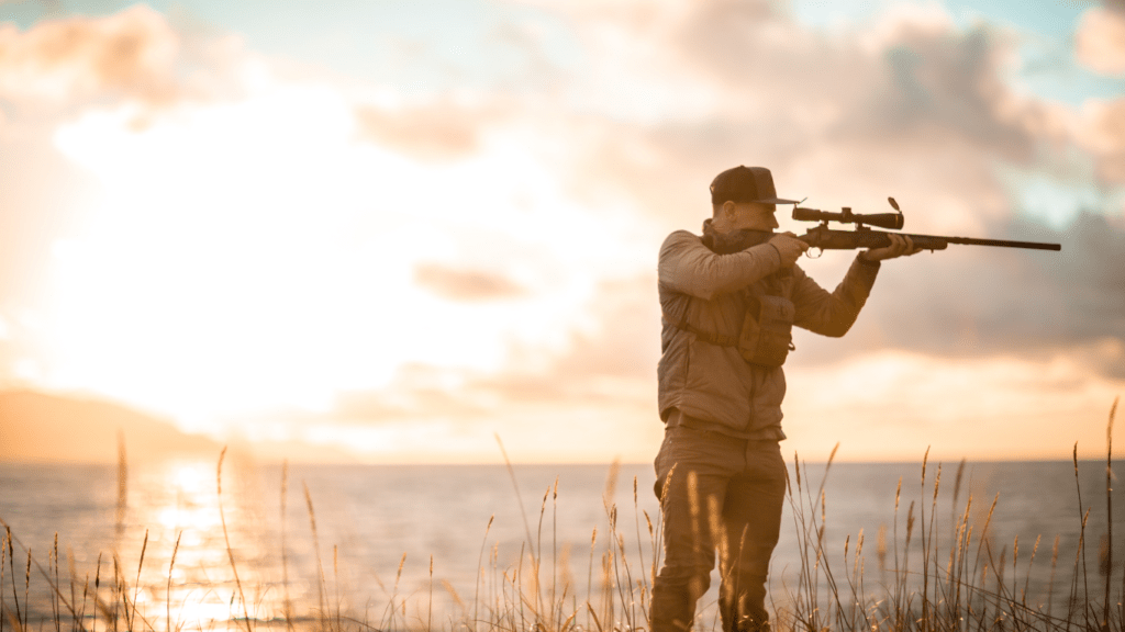 a person with a rifle standing