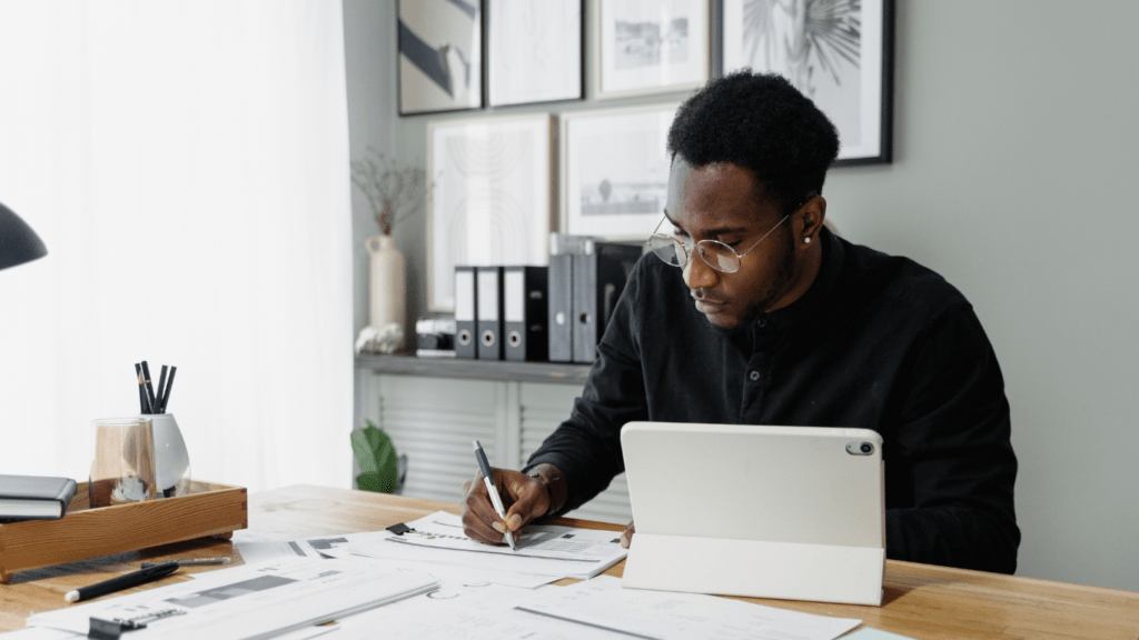 man writing an article