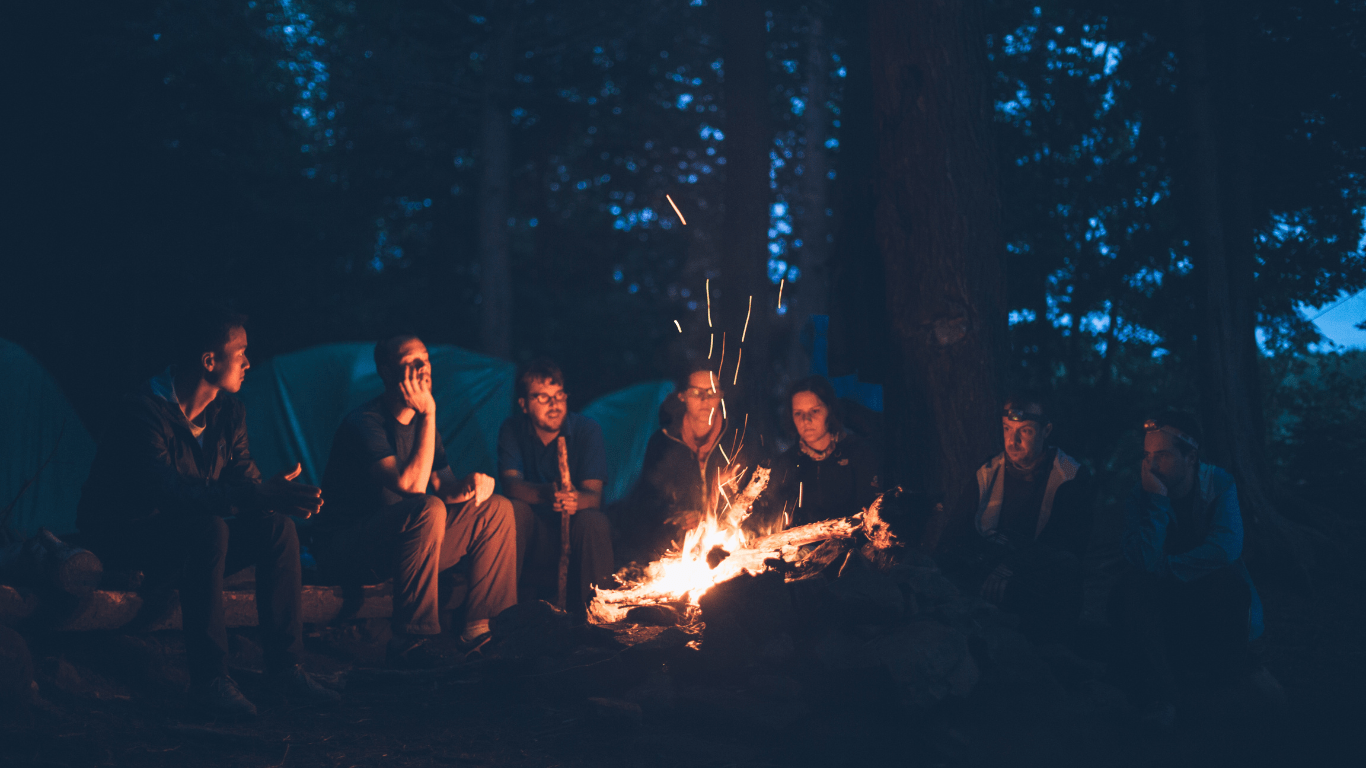 a bonfire is lit on a black background