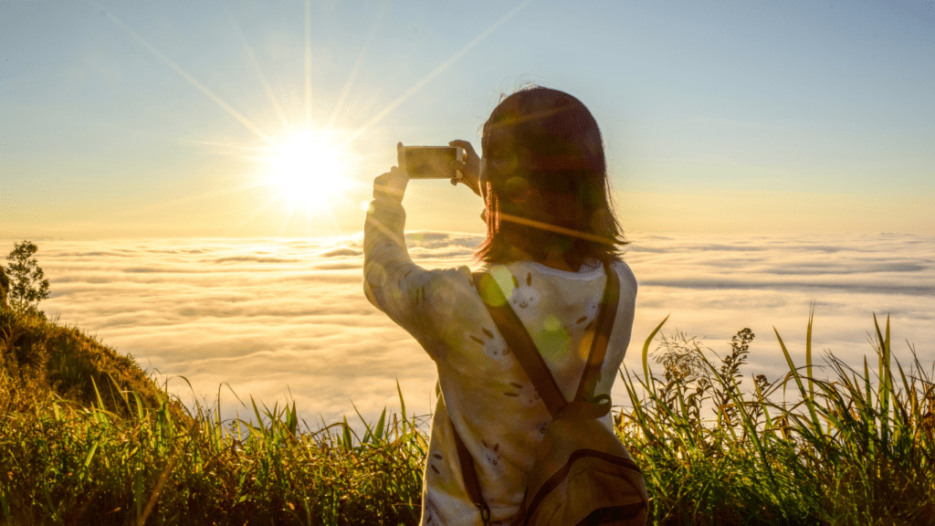 a person taking a picture with a camera