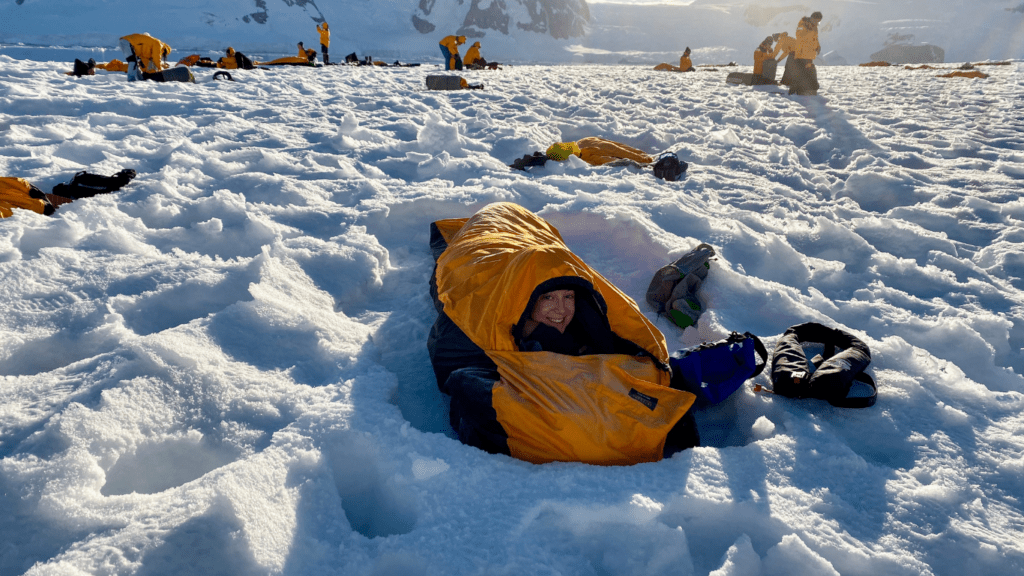 a person wearing a sleeping bag