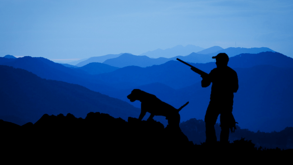 a person with a rifle standing