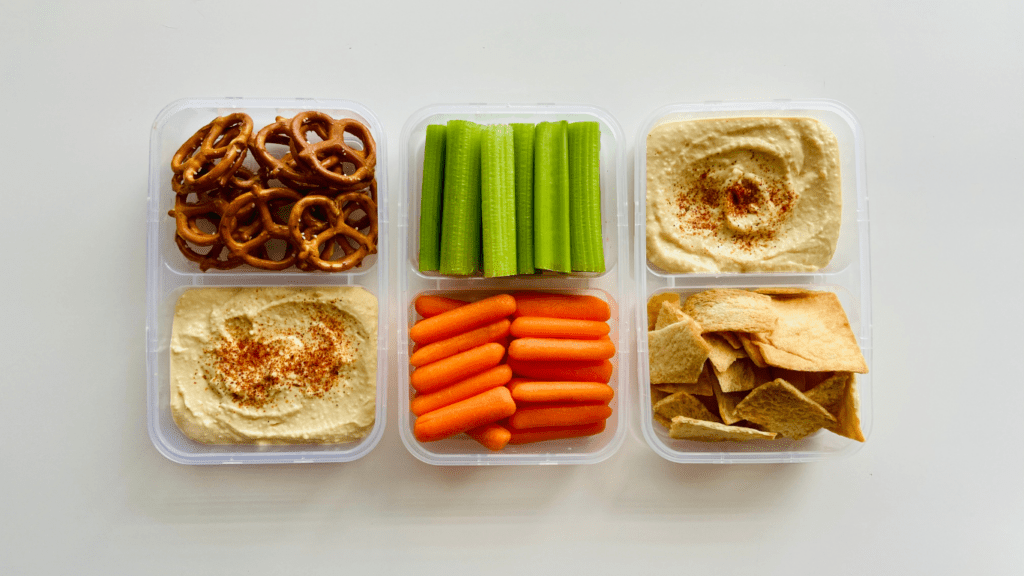 a plastic container filled with vegetables